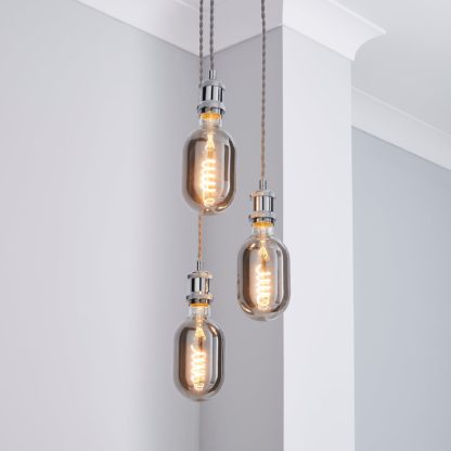 10810ef4bc1f89eeb1f07e04276b7f443ba82b48cccc934f7942c478a1e7d258-1.jpg An Image of Charlie 3 Light Cluster Flex Fitting Chrome