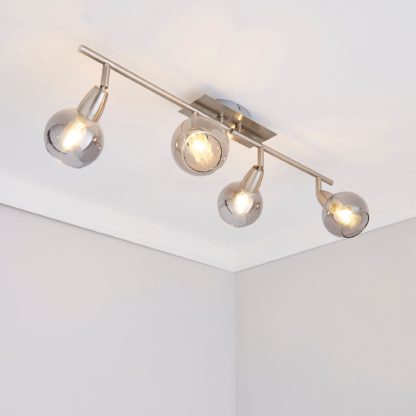 169ae0948137774c3c6308883f2cfcfaaa2389d68df20eb171ee914152b511b1-1.jpg An Image of Tia 4 Light Nickel Spotlight Bar Satin Nickel