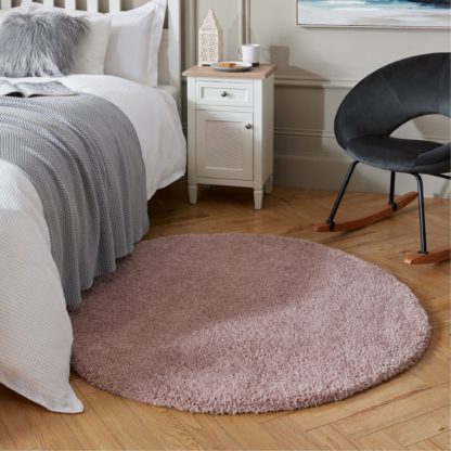 2d52bb93fa5c8d48121ab3de4dafc32a13492cad9705258edc2439e61c9dc54d-1.jpg An Image of Cosy Teddy Round Rug Yellow