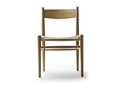 An Image of Carl Hansen & Søn CH36 Chair Black Oak Natural Cord Seat