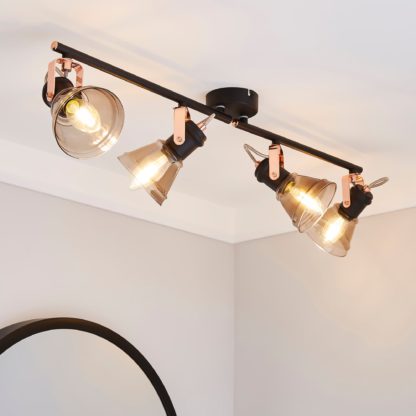 An Image of Milas 4 Light Black Industrial Spotlight Bar Black