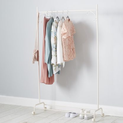 5a63ebddb832d3663892c7e0ea51c20fe388a136ac81805deef9f8b9fb6569cd-1.jpg An Image of Cream Clothes Rail Cream