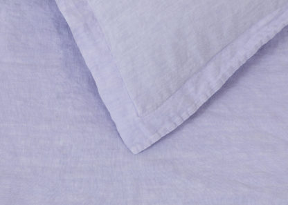 72f2db2f3159f1f362bfda06817609c757337e3e995b8b1ba15fdcf89121af22.jpg An Image of Heal's Washed Linen Lilac Duvet Cover Double