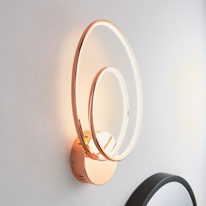 An Image of Menton Integrated LED Swirl Copper Wall Light Copper