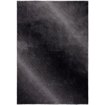 8a872fed179fd3d086b4c8b0cba3ce95d7a152a076b9c297ee0ba32728fb829a-1.jpg An Image of Ombre Soft Sparkle Rug Charcoal