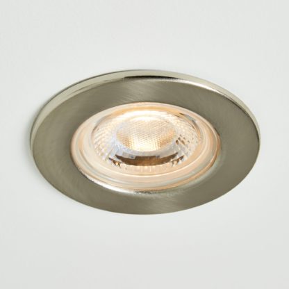 8af070ad4cfb72cbc48866219640789bd53b7de823d92ce821e03736213bf4be-1.jpg An Image of Basics 1 Light Integrated LED Satin Nickel Recess Light Silver