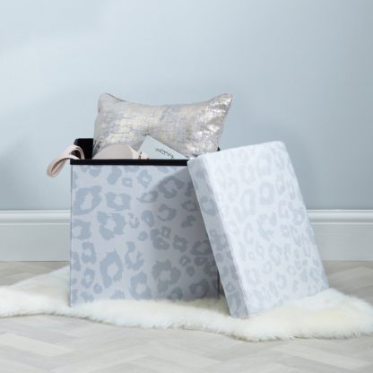 An Image of Snow Leopard Animal Print Foldable Cube Ottoman Natural