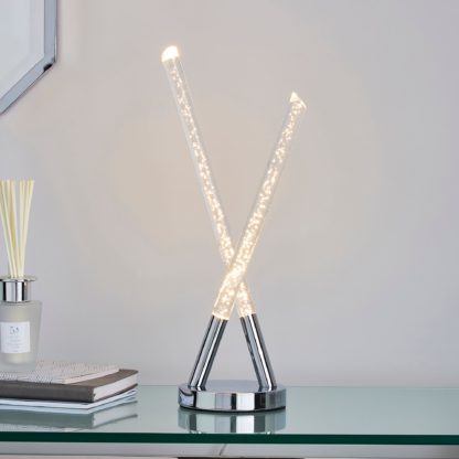8c93451b1ad58bc23d6b8fb5c08bcb96fc233068df39b02964811c814cbfe477-1.jpg An Image of Tassani 2 Light Intergrated LED Bubble Glass Table Lamp Silver, Chrome
