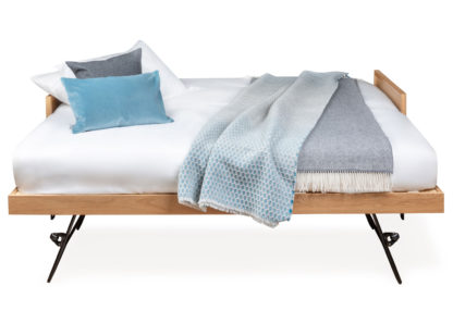 93091621a5906b8a840d32ffa775801317652747240997c4b01735b7f1c17d64.jpg An Image of Heal's Brunel Guest Bed With Mattresses Oak