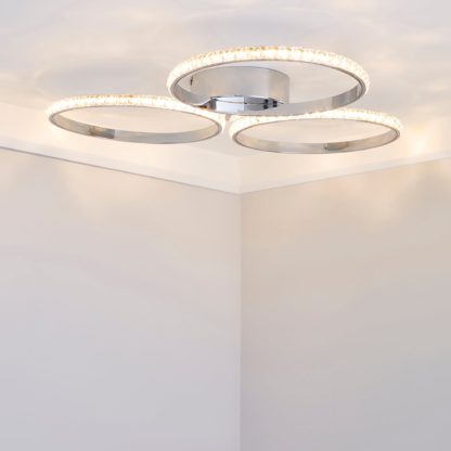 a26964c33a2e3736672379d3b208754b56f1e72ff0f64a40224a300fe93aec36-1.jpg An Image of Oraylia 3 Light Integrated LED Hoops Jewel Chrome Ceiling Fitting Chrome