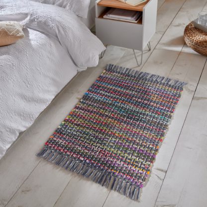 c52ef3ca7f3218bca9219ca9abf737525f69593426c19def59ecb12e2de59f74-1.jpg An Image of Marimba Rug Marimba Ivory