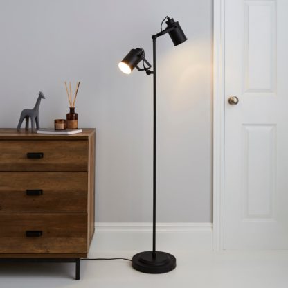 cd30aca22893498b979a3ea13d192cfe6a6c19c379db68887144858e0e24146c-1.jpg An Image of Healy 2 Light Black Floor Lamp Black