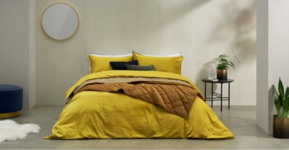 e165777901332ee8c01026d45662aca45d9598e8a9e3851ff491720783d52f02.jpg An Image of Hylia Washed Cotton Satin Duvet Cover + 2 Pillowcases, Double, Antique Gold
