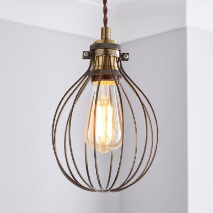 f142bb000204afb869116531746db73d1ed87179809ca64c0a2be9340d47135a-1.jpg An Image of Charlie Industrial Bulb Cage Pewter