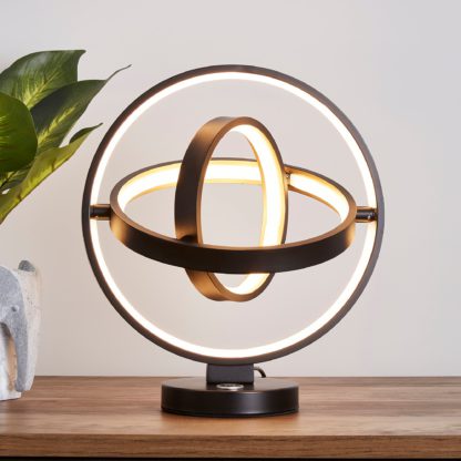 08cc0de3e68cb8aed7314f5673d739110d1ac15ba75ea49baf2979d4bd058624.jpg An Image of Chrome Ida Integrated LED Table Lamp Chrome