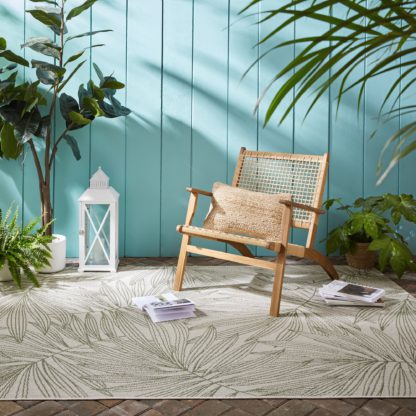 An Image of Tropical Leaves Indoor Outdoor Rug Cream and Green