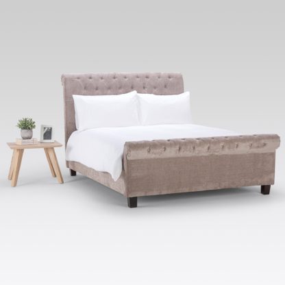448c58680bea729ea42558965d03d6802795d523843b318e15edf301b0bc9752.jpg An Image of Orbit Mink Velvet Upholstered Bed Frame Beige