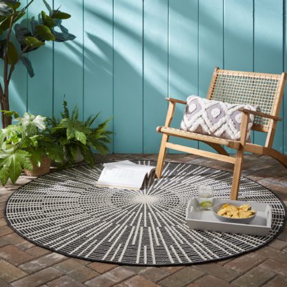 8a28fca90bc28a233ca5ac486dac64c50c3bfdff1a383bbcff555d6d1d7069d3.jpg An Image of Sticks Indoor Outdoor Circle Rug Grey