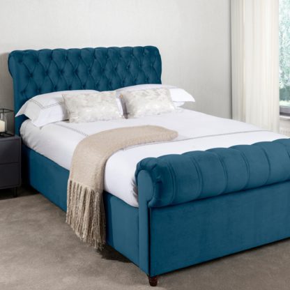 a8c97e13308bf07b722c8b12798ed00d84e3449c2ff418a8746e1be316542781.jpg An Image of Fabio Velvet Teal Bed Frame Blue