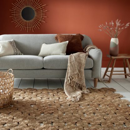 b755d82133ad105b47f4effdf545dcfc2a2eacc34961ed78e7bdfd72baed89f5.jpg An Image of Swirl Handmade Jute Rug Brown