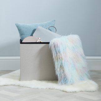 An Image of Pastel Faux Fur Foldable Cube Ottoman Pink