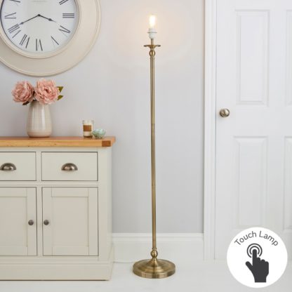 15b1f7be9d7f15ba554cb1daeada3a42c617c9691b3550581a80d8be90b67acc.jpg An Image of Irene Touch Dimmable Antique Brass Floor Lamp Base Brass