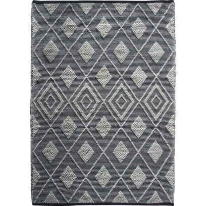 An Image of Sheya Black and Natural Rug Black and white