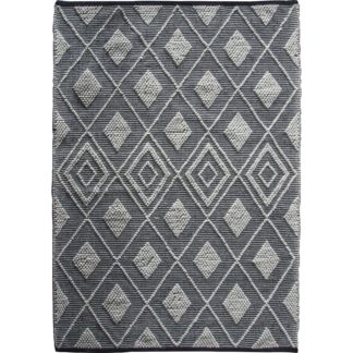 An Image of Sheya Black and Natural Rug Black and white