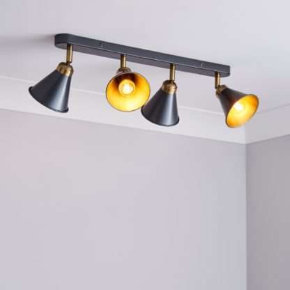 32a0039b4ce4ec67b73396fb637740a8657f2da65d6a4c99a2f255be439d6db2.jpg An Image of Logan 4 Light Grey Spotlight Bar Grey
