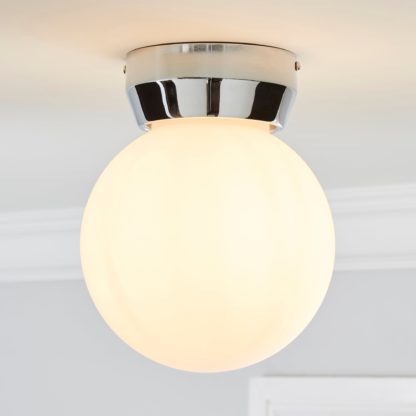 5a197d52edcfd95db3da34ba862852f335888b2b344857f63d5f53eb4b4b26d0.jpg An Image of Harlow 1 Light Frosted Glass Flush Ceiling Fitting White