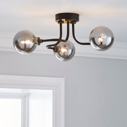 An Image of Tanner 3 Light Black Ceiling Fitting Black