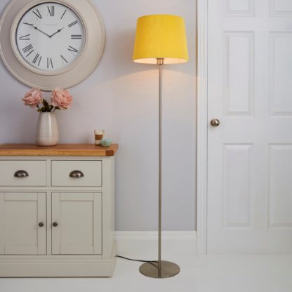 7a65b2ac4a6a8637380f2b0afe3500a9535620025b8e4d584839266d92e1d4e1.jpg An Image of Tula Micro Pleat Ochre Shade Floor Lamp Ochre