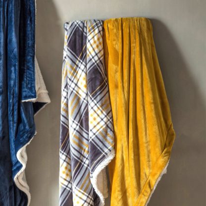 9d6896fd55a433c964774f23b641e33a61df93c9b08b8656353c0eb1020b37a6.jpg An Image of Sherpa Ochre Throw Yellow