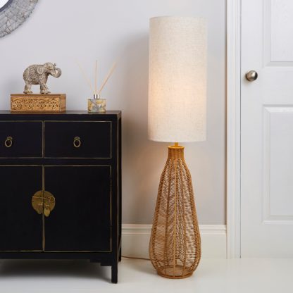 a0716449d2b70a777c40ce860b4d3aeae304d5440973447144f4c94a404fd9d9.jpg An Image of Kylo Woven String Floor Lamp Beige