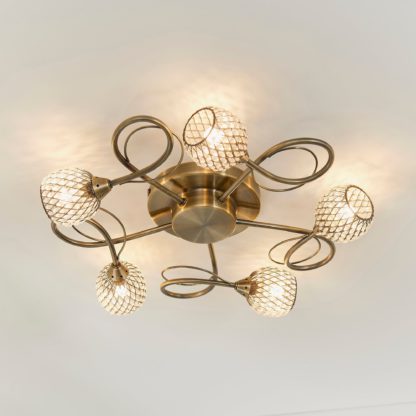 An Image of Malden 5 Light Flush Ceiling Fitting Antique Brass