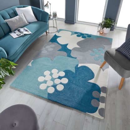 cd04651a97b9735d3e2445d7ae9da82f90065ceead1276c24a3fcf26d4edfb10.jpg An Image of Retro Floral Rug Retro Floral Raspberry