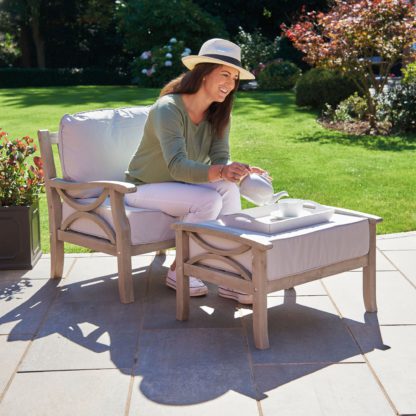 An Image of Sorrento Grey Hardwood Armchair with Stool Brown and Grey