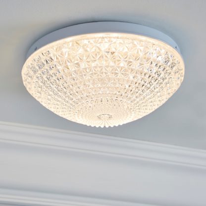 017a134c194ffc2be408bae86bdf808106bba5d7ab5b1f88ba6262c87fd2fd24.jpg An Image of Termoli 20cm Integrated LED Flush Ceiling Fitting Clear and White