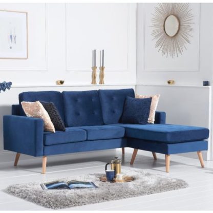 2284e9b7925f029357e5f1c89d1aa7c4e462f9d35c060a5f87d89d06d40353aa.jpg An Image of Wescole Velvet Reversible Chaise Corner Sofa In Blue