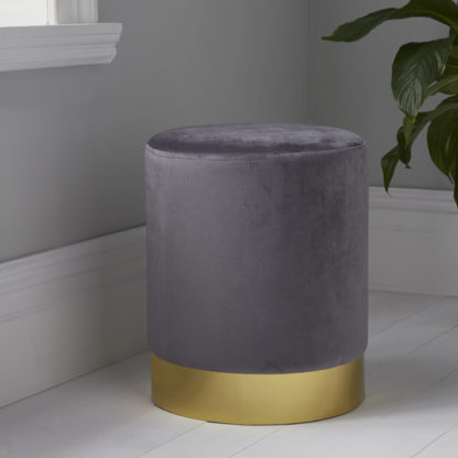 2e3fcc6c2896dd4e5d609be1a3a88da015a802ac4dcc5c4b85c867fbc5a23d05.jpg An Image of Beverly Round Velvet Stool In Grey And Gold