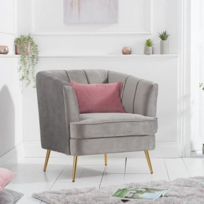 3360e27585ce47b58790940b986aa04f10f24aa830450a349ece5e1a18cff297.jpg An Image of Lucite Velvet Upholstered Armchair In Grey