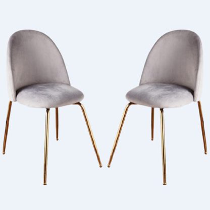 3818b3cf3eaefc2cef4a46a0487d91386b798bfe7f3ee69a8ff29a75ecced743.jpg An Image of Coonan Grey Velvet Dining Chairs With Gold Legs In A Pair