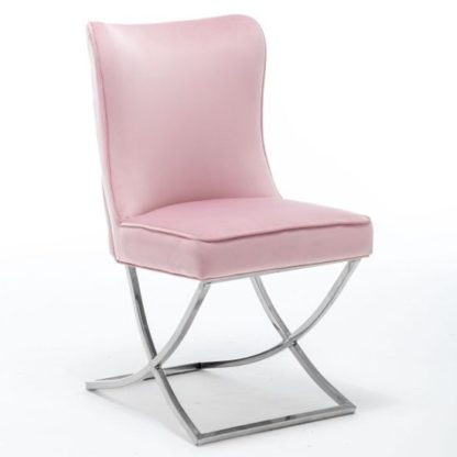 38deb943b19f8e32e948d960fc9bb26c0e3efe0a933df0d14dde0b374a12a4ab.jpg An Image of Baltec Velvet Upholstered Dining Chair In Pink