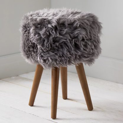 An Image of Bovril Sheepskin Stool In Grey With Solid Oak Legs