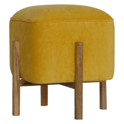 41fe3ddc9065161a2ca8e46b1e050ba3dbfe1fc7ad7801da70e1efde1fe705e0.jpg An Image of Clarkia Velvet Footstool In Mustard With Solid Wood Legs