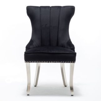 An Image of Monten Lion Knocker Velvet Dining Chair In Black