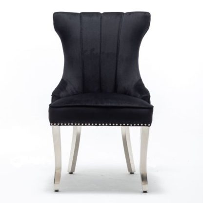 An Image of Monten Lion Knocker Velvet Dining Chair In Black