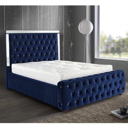 60c294a887c9177ab210dc72ae50fd0c727ec914488eb34838c69aa79cf8d361.jpg An Image of Eastcote Plush Velvet Mirrored Super King Size Bed In Blue