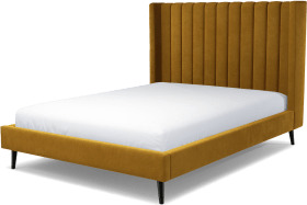 An Image of Cory King Size Bed, Dijon Yellow Cotton Velvet with Black Stained Oak Legs