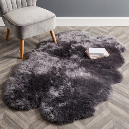 68723eb266f13a77e03d7fb7cbf6a13ac976e0b6e1680817965bfd167cfd6f8e.jpg An Image of Quad Sheepskin Rug Pink